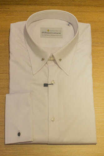 White pin collar shirt with a metal barbell