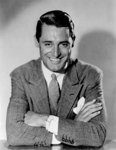 Cary Grant w grubej marynarce w kartę i z gładkim wełnianym krawatem