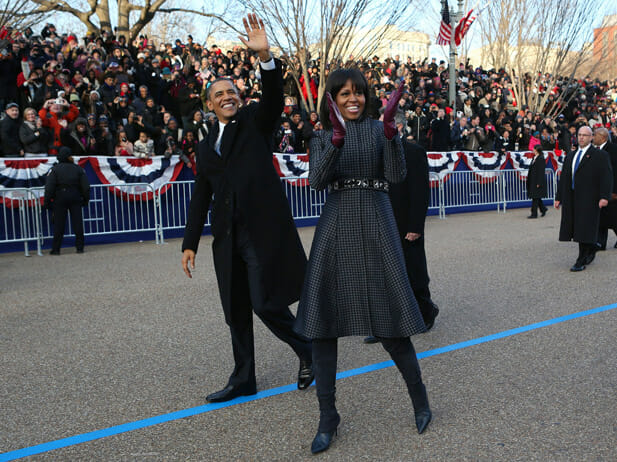 U.S. President Barack Obama and first lady Michelle Obama walk along Pennsylvania Avenue towards the White House during the inaugural parade from the U.S. Capitol in Washington, January 21, 2013. REUTERS/Doug Mills/Pool (UNITED STATES - Tags: POLITICS)