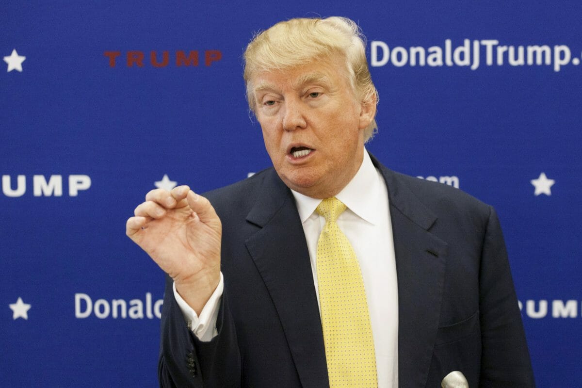 U.S. Republican presidential candidate Donald Trump speaks while campaigning for the 2016 Republican presidential nomination at the Madison County Republicans "Roundup BBQ" dinner at Winterset High School in Winterset, Iowa June 27, 2015.    REUTERS/Brian Frank